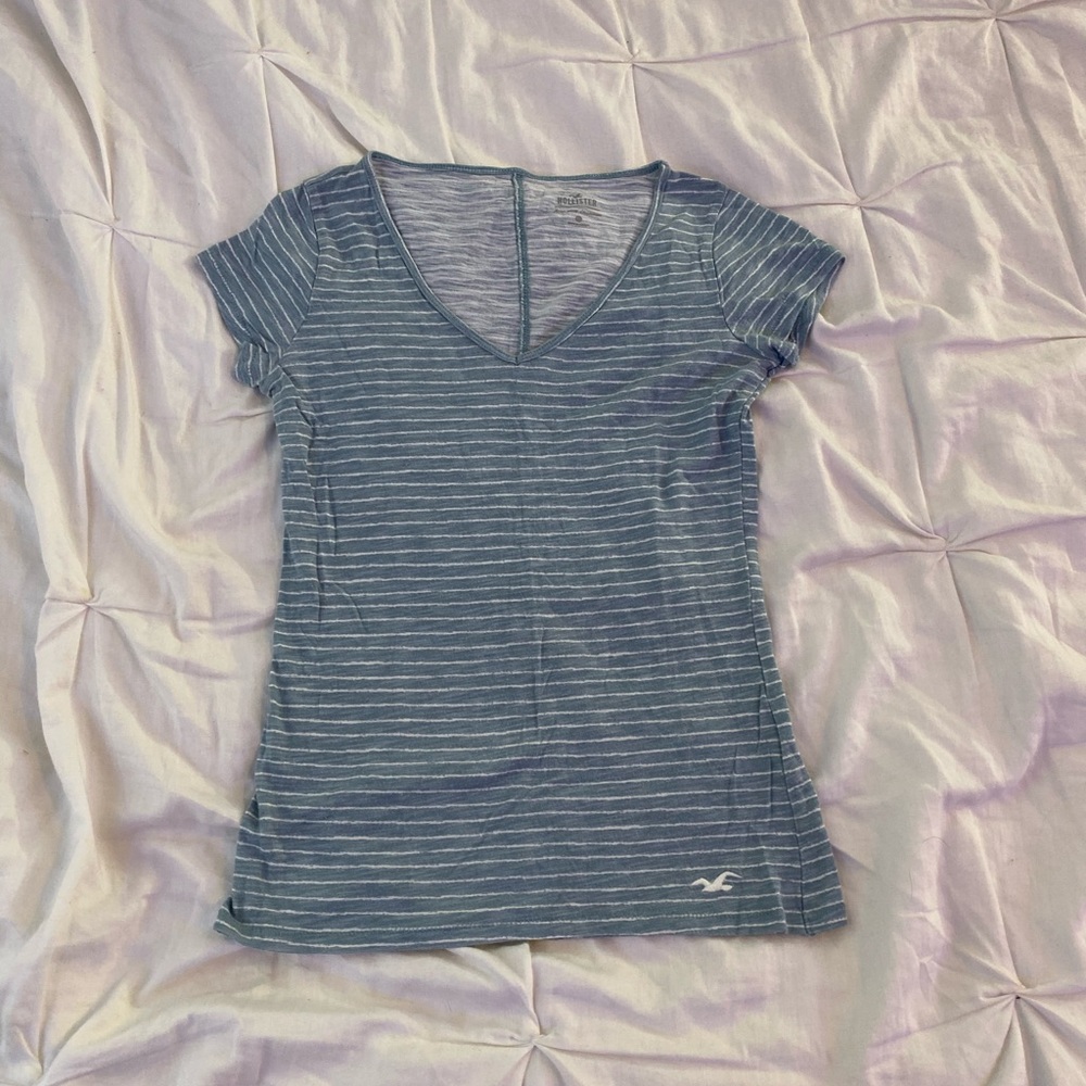 Blue and white striped Hollister shirt.